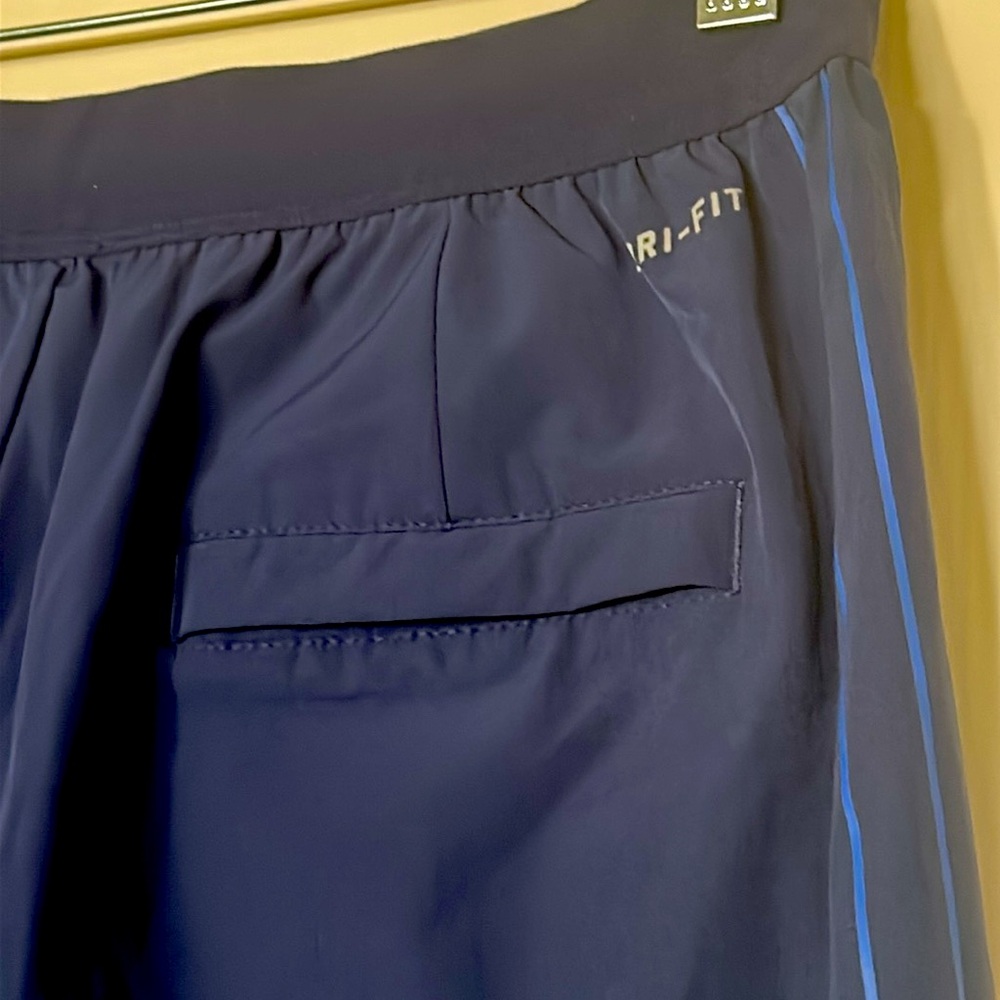 NWOT. Nike Dri-Fit men’s tennis shirt pants. Lightweight and breathable. - Picture 6 of 10